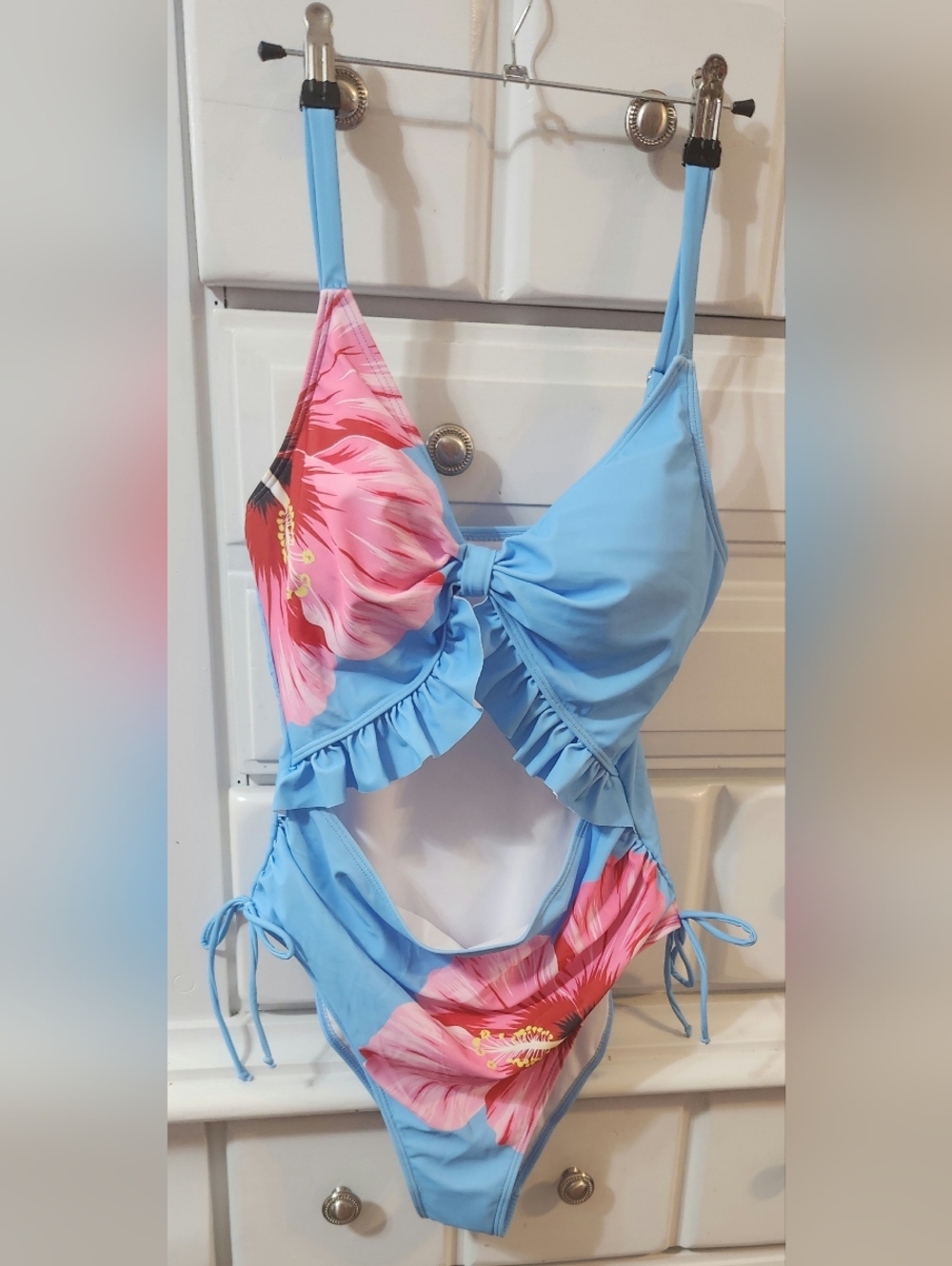 Brand New Blue Floral One-Piece Swimsuit with Ruffle Detail and Cut-Out Stomach